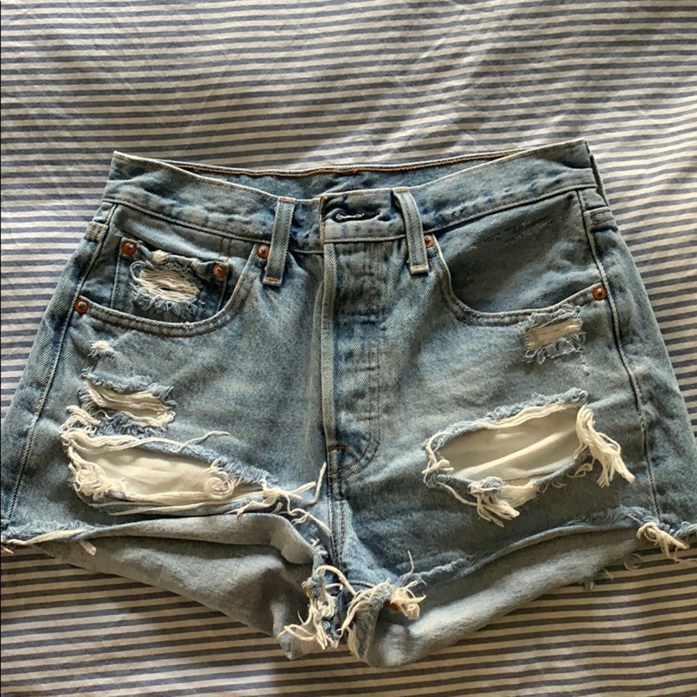 Levi’s 501 high waisted distressed jean shorts
